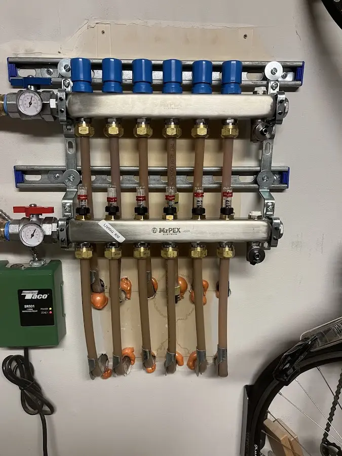 Plumber performing Water Heater Repair at a residential property in Barron